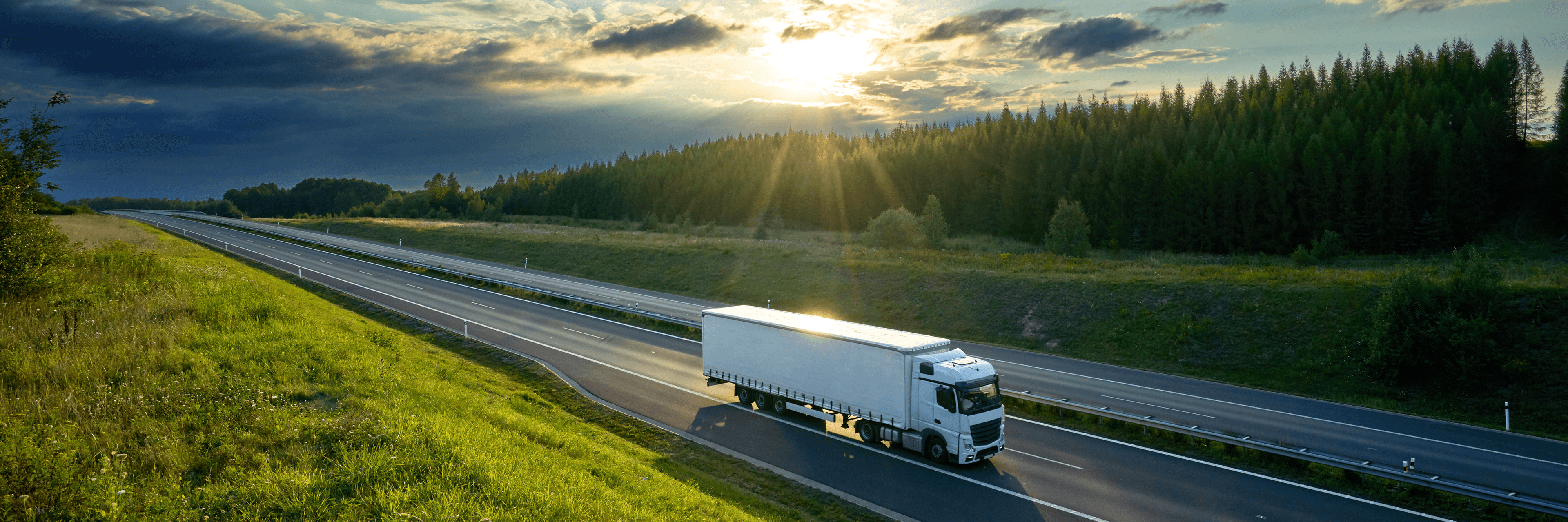 Freight yard with shipping containers, truck and cargo plane